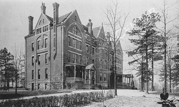 A residence hall at Gammon Theological Seminary in 1895, a long brick building with a mansard roof.