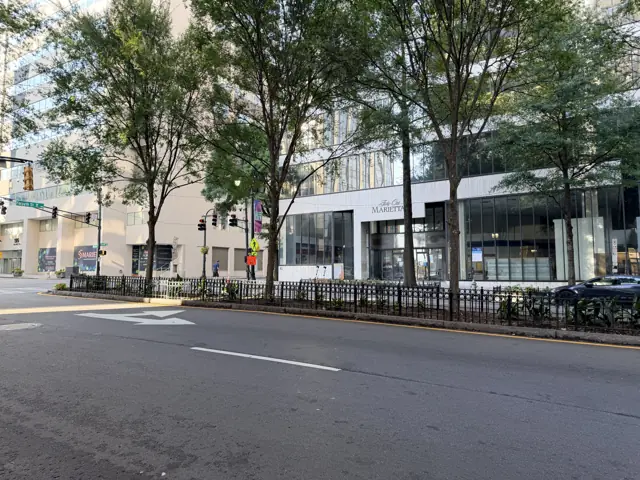The corner of Marietta and Forsyth with the 41 Marietta building and a bus stop.