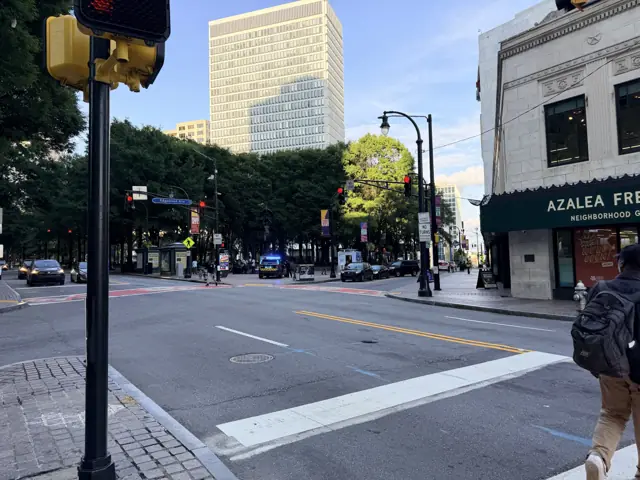Peachtree Street north from Five Points, trees and the corner grocery.