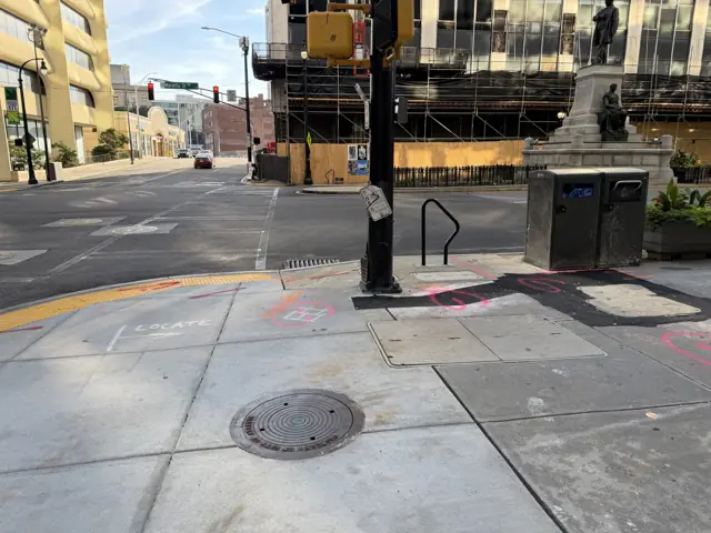 The corner of Marietta and Forsyth with the monument in the middle of the street.