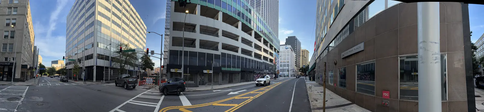 A wide view of Decatur Street at Pryor with the parking deck and the office towers behind it.